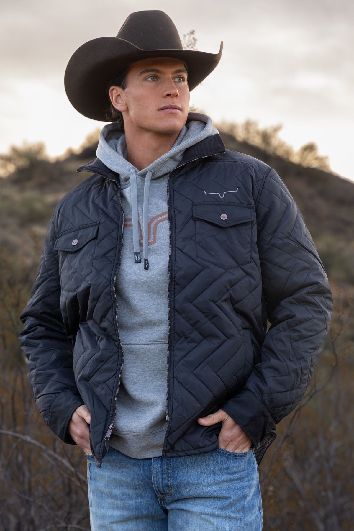 Kimes Ranch Skink Jacket in Black with a chevron quilted pattern and front pockets