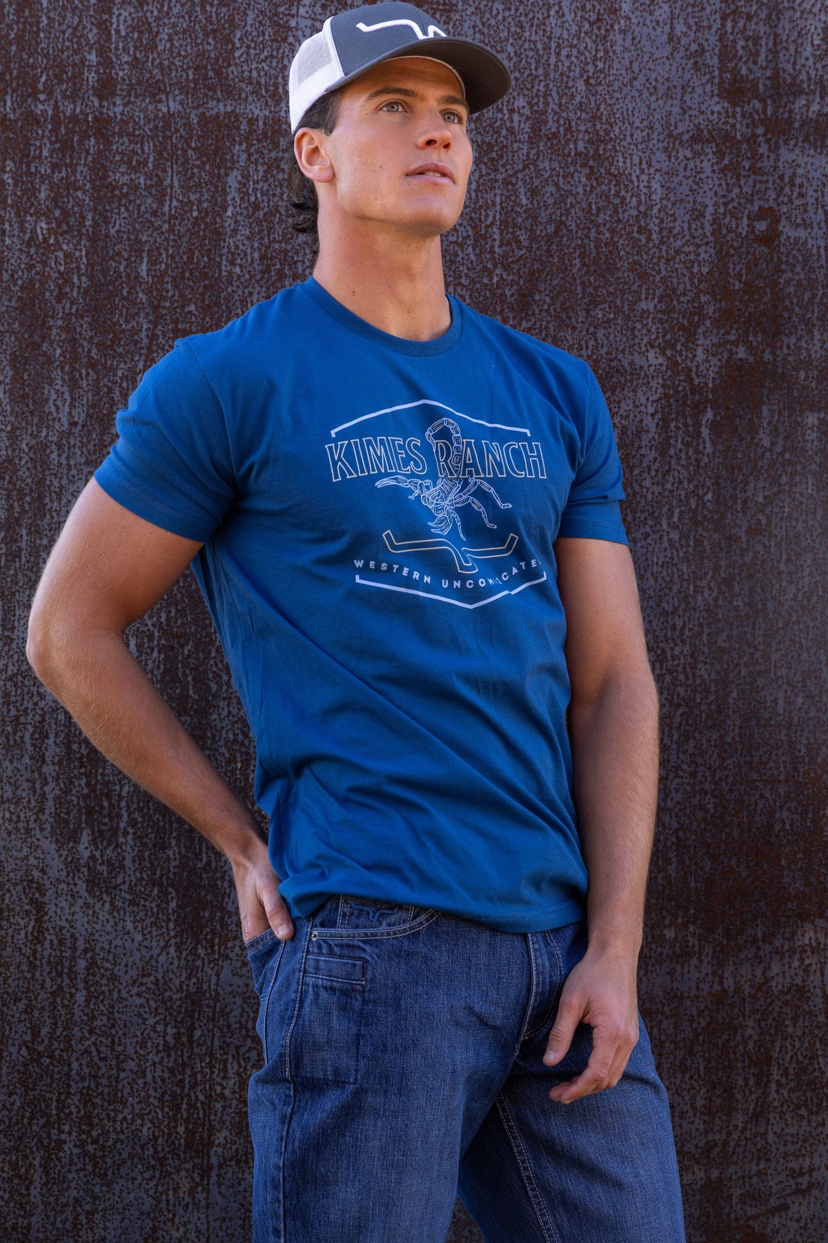Kimes Ranch Sting shirt in Marine Blue with a scorpion graphic and Western Uncomplicate text