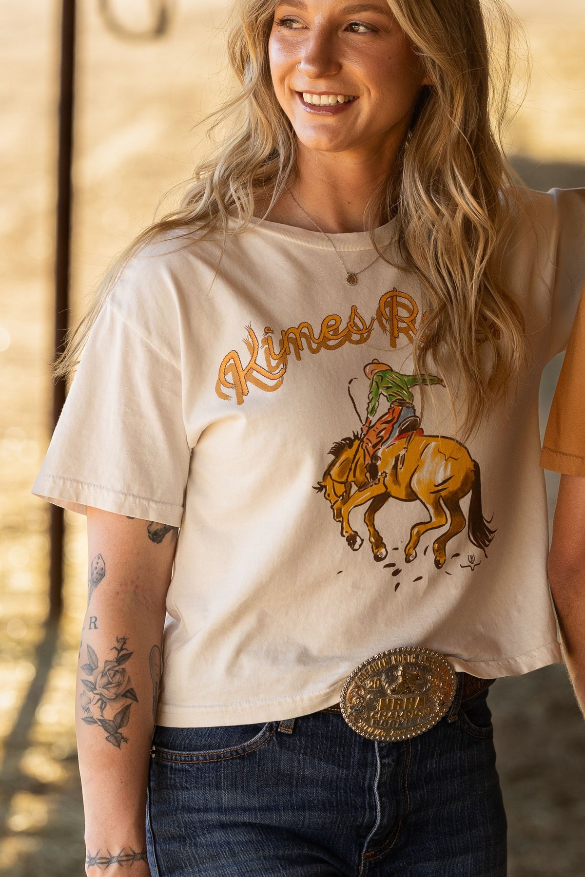 Kimes Ranch Lucky B Rodee-oh! shirt in Bone with a rodeo graphic and Kimes Ranch logo