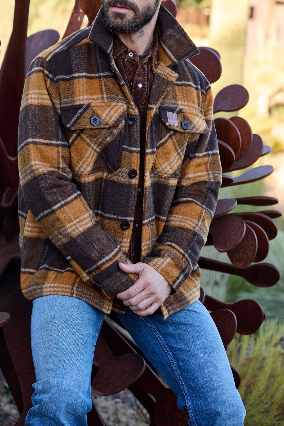 Kimes Ranch Marquette Wool Jacket in Brown with a plaid pattern and button front pockets