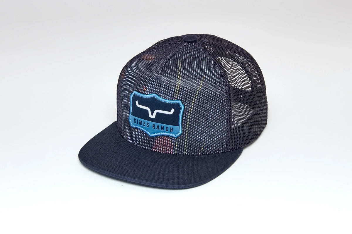 Kimes Ranch Willard hat in Navy, side view, with a plaid mesh back and embroidered logo patch