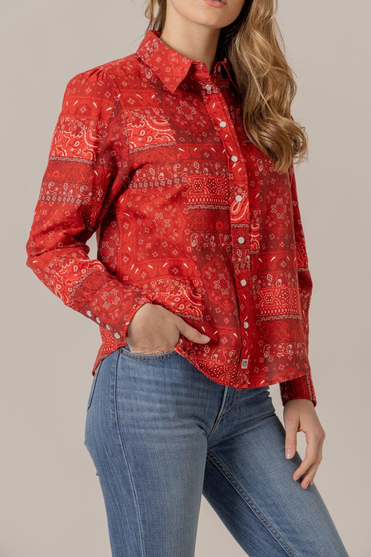 Kimes Ranch Winnie top in Red, side view, with a bandana print and front pockets
