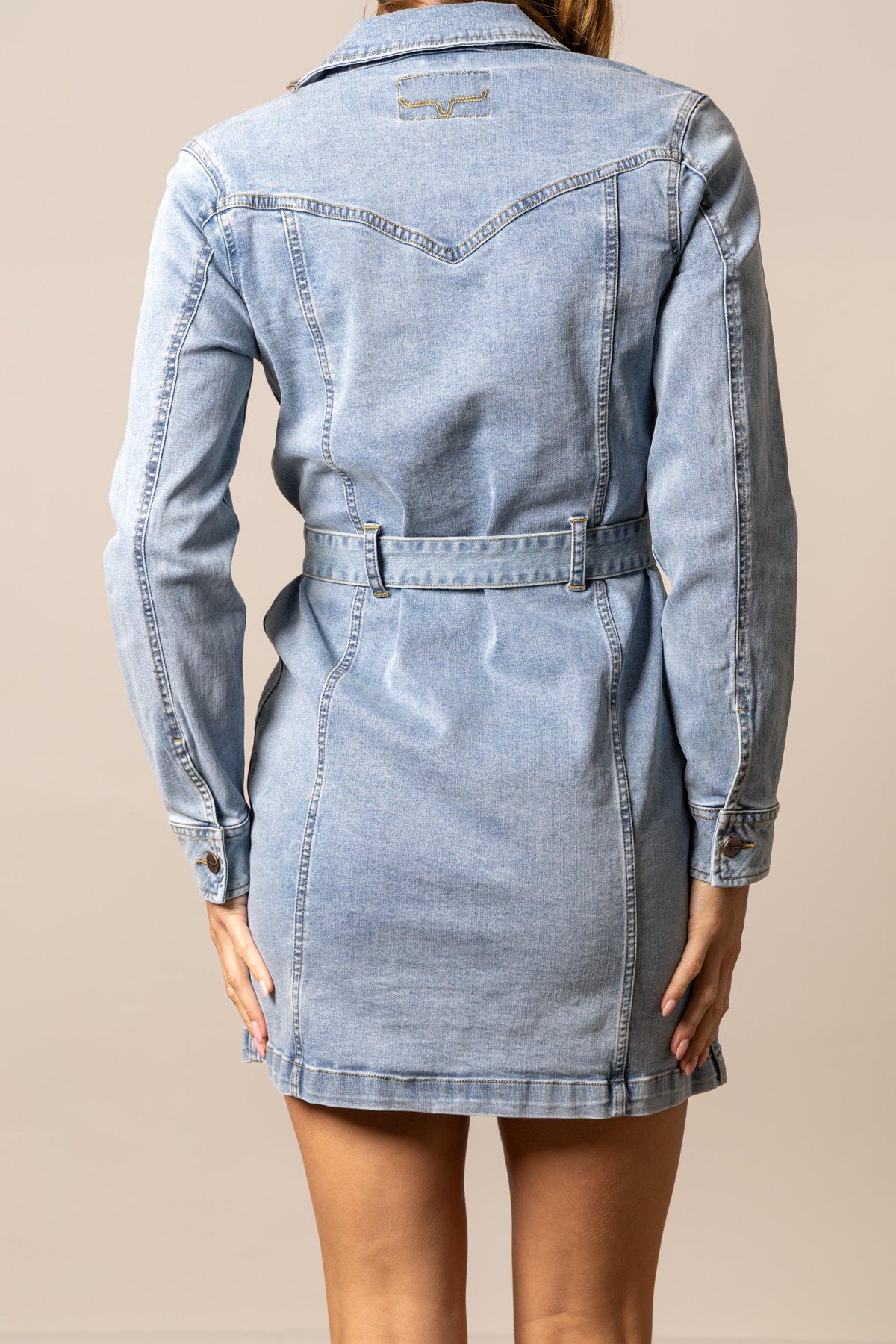 Kimes Ranch Winslow Trucker Dress in Light Wash Indigo, back view, with a back yoke and a matching belt