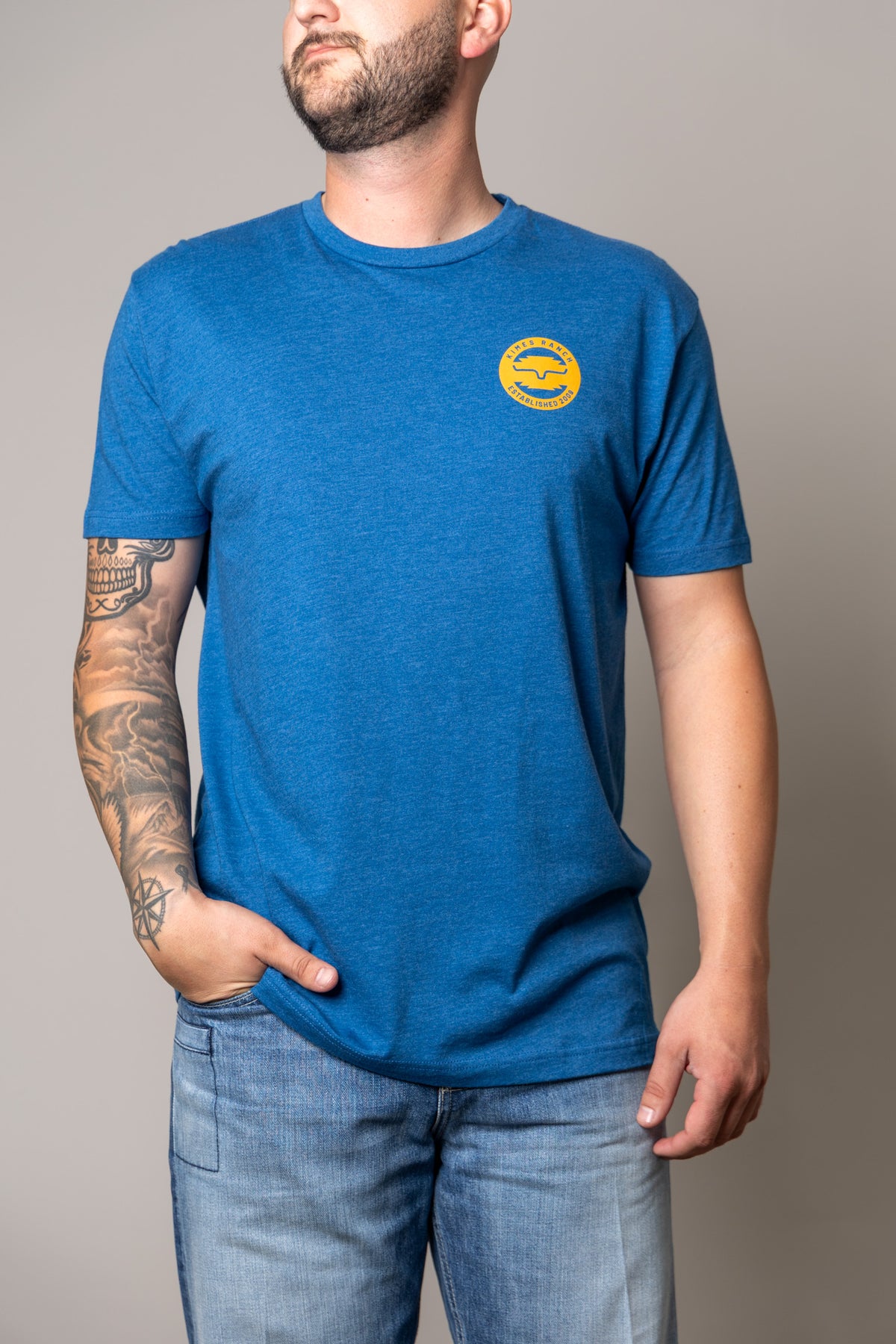 Kimes Ranch Wood Stamp shirt in Heather Cool Blue with a chest logo