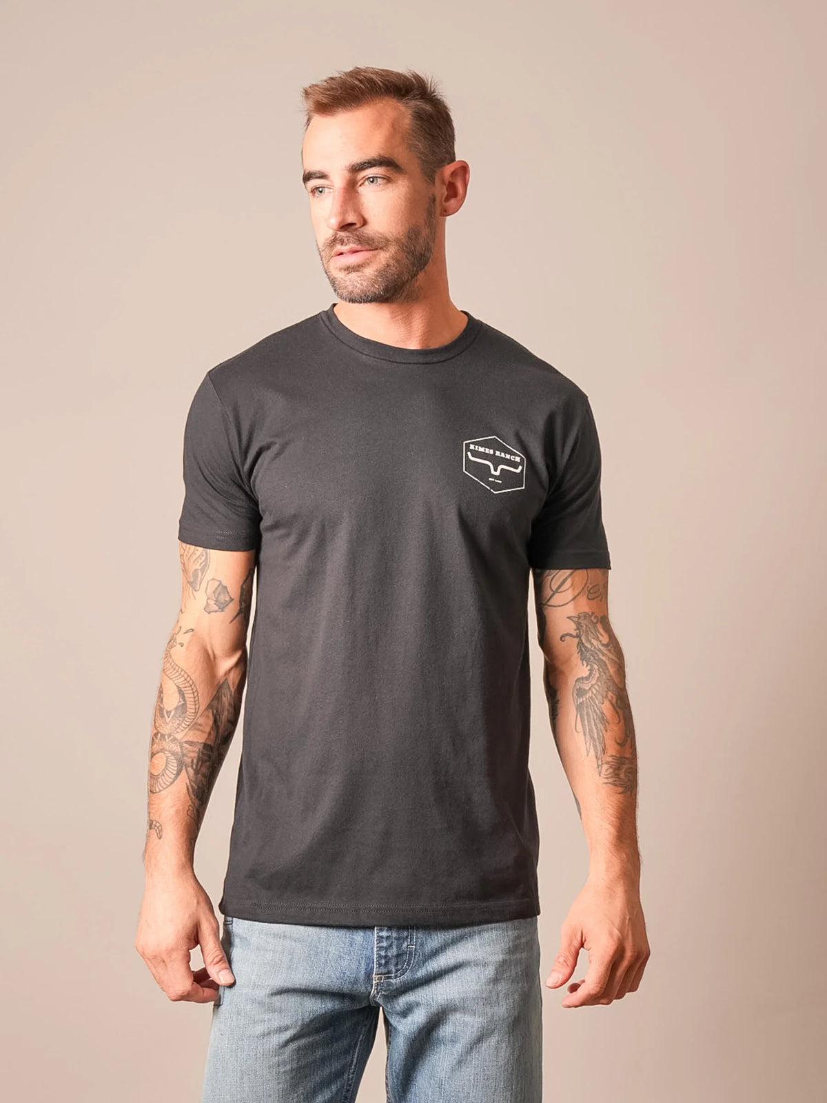 Kimes Ranch Wooden Hex short sleeve shirt in Black with a white logo on the chest