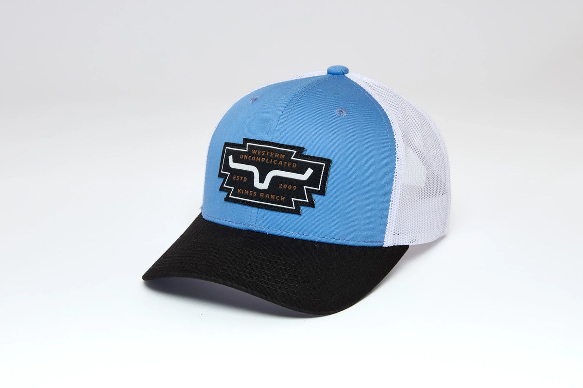 Kimes Ranch Woodland hat in Blue, side view, with a black brim and white mesh back featuring the Kimes Ranch logo