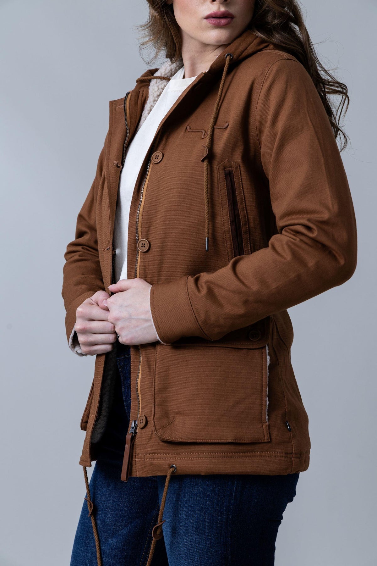 Kimes Ranch AWA Jacket in Work Wear Brown, side view, with sherpa lining and button closure