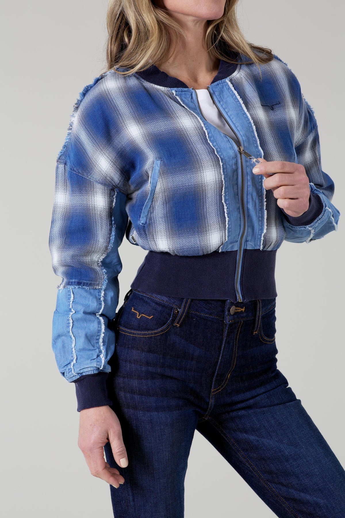 Kimes Ranch Belinda Bomber Jacket, side view, in blue plaid with panels and navy ribbed trim