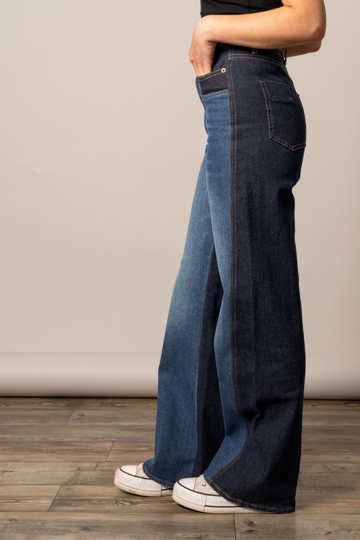 Kimes Ranch Camila pants in blue denim with two-tone paneling and visible contrast stitching