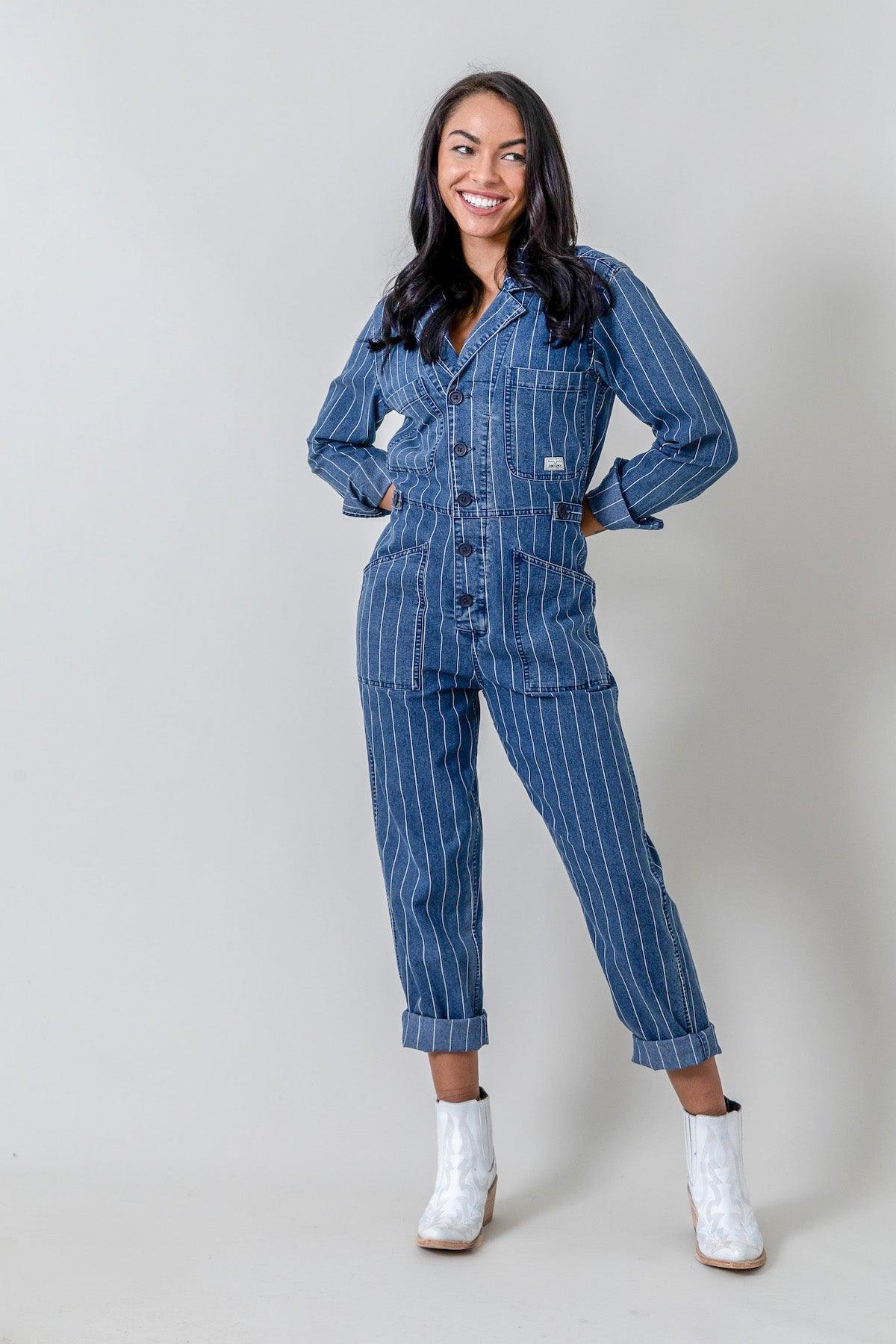 Kimes Ranch Chimayo Jumpsuit in Indigo with long sleeves, front pockets, and a button front
