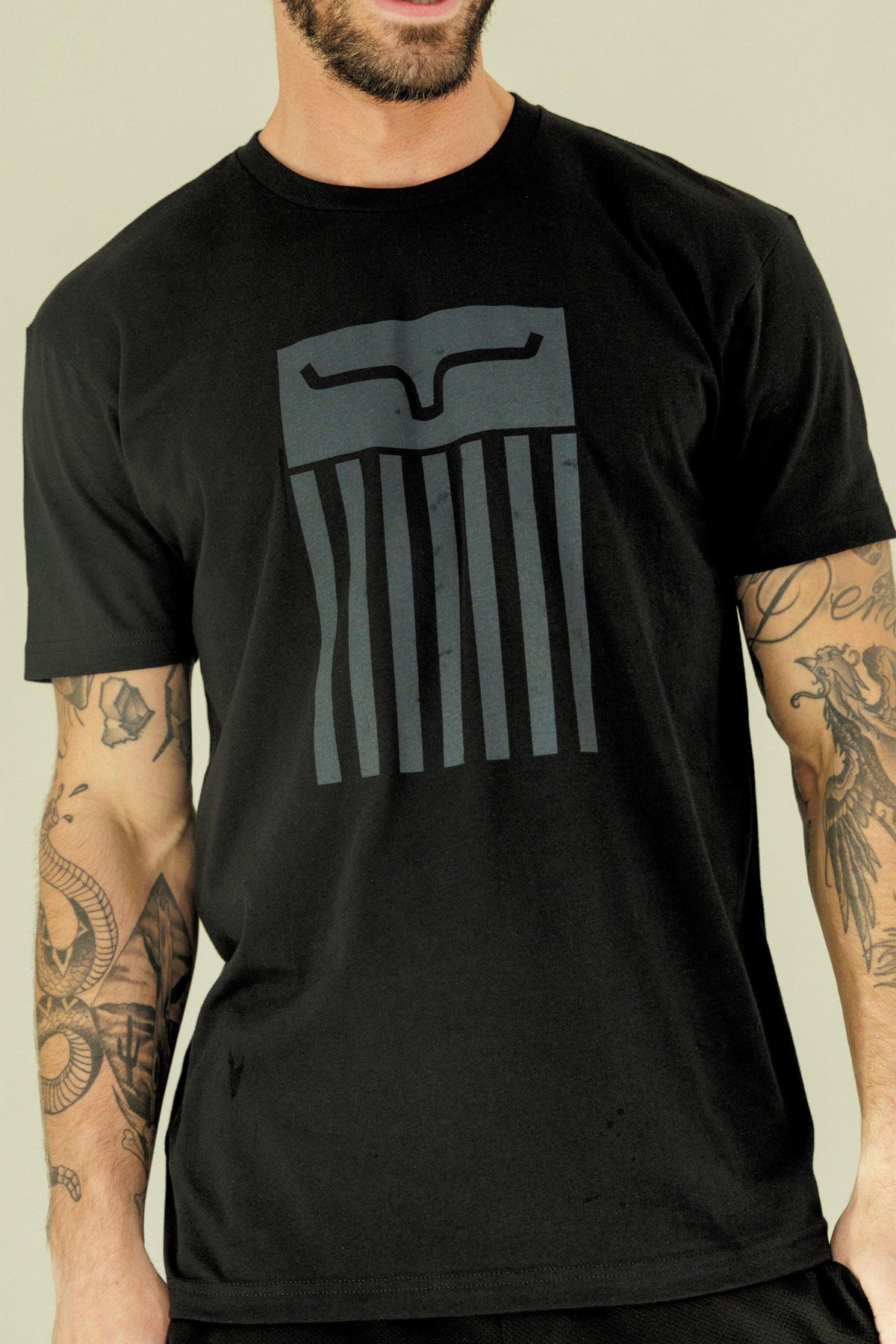 Kimes Ranch Cody Tee Shirt in Black with a stylized steer logo graphic on the chest