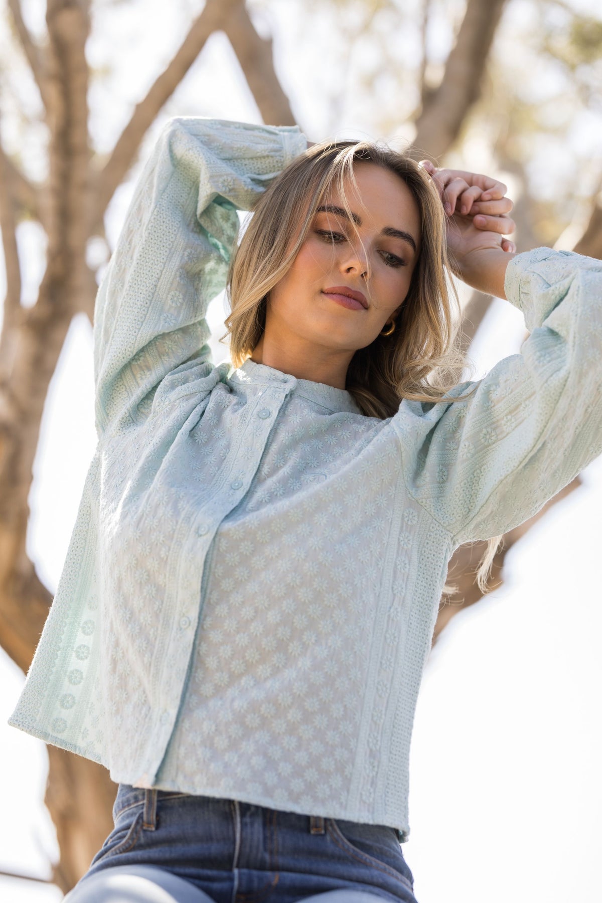 Kimes Ranch Daisychain top in Ice Blue with floral embroidery and long sleeves