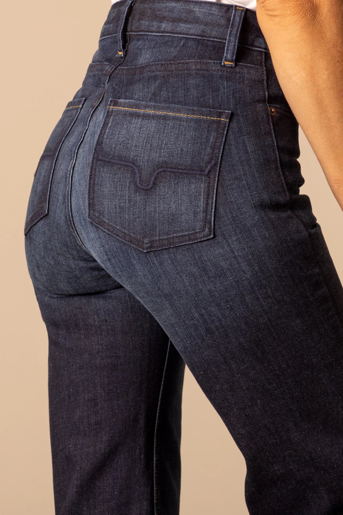Kimes Ranch Olivia jeans in Dark Wash, back view, showing the back yoke with contrast stitching and back pockets