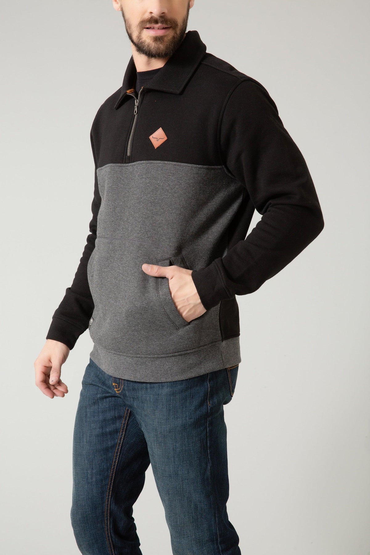 Kimes Ranch Diamond Head QZ Sweatshirt in Black, side view, with grey colorblock body and front kangaroo pocket
