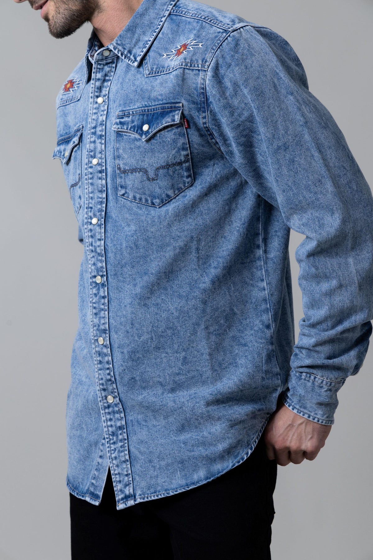 Kimes Ranch Durango Denim dress shirt in Indigo Blue, side view, with embroidered chest pockets and Kimes Ranch logo