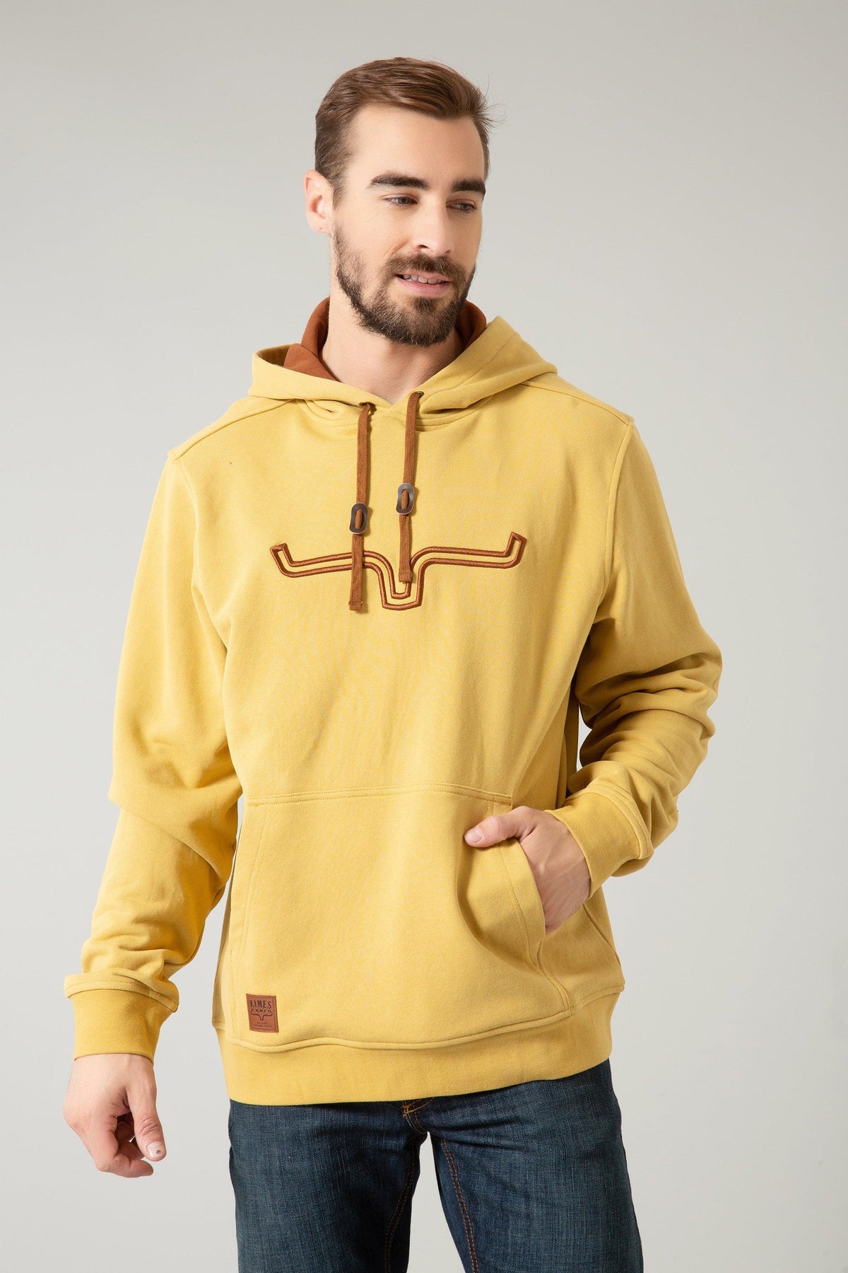 Kimes Ranch Fast Talker Hoodie in Mustard with embroidered Kimes Ranch logo and front kangaroo pocket