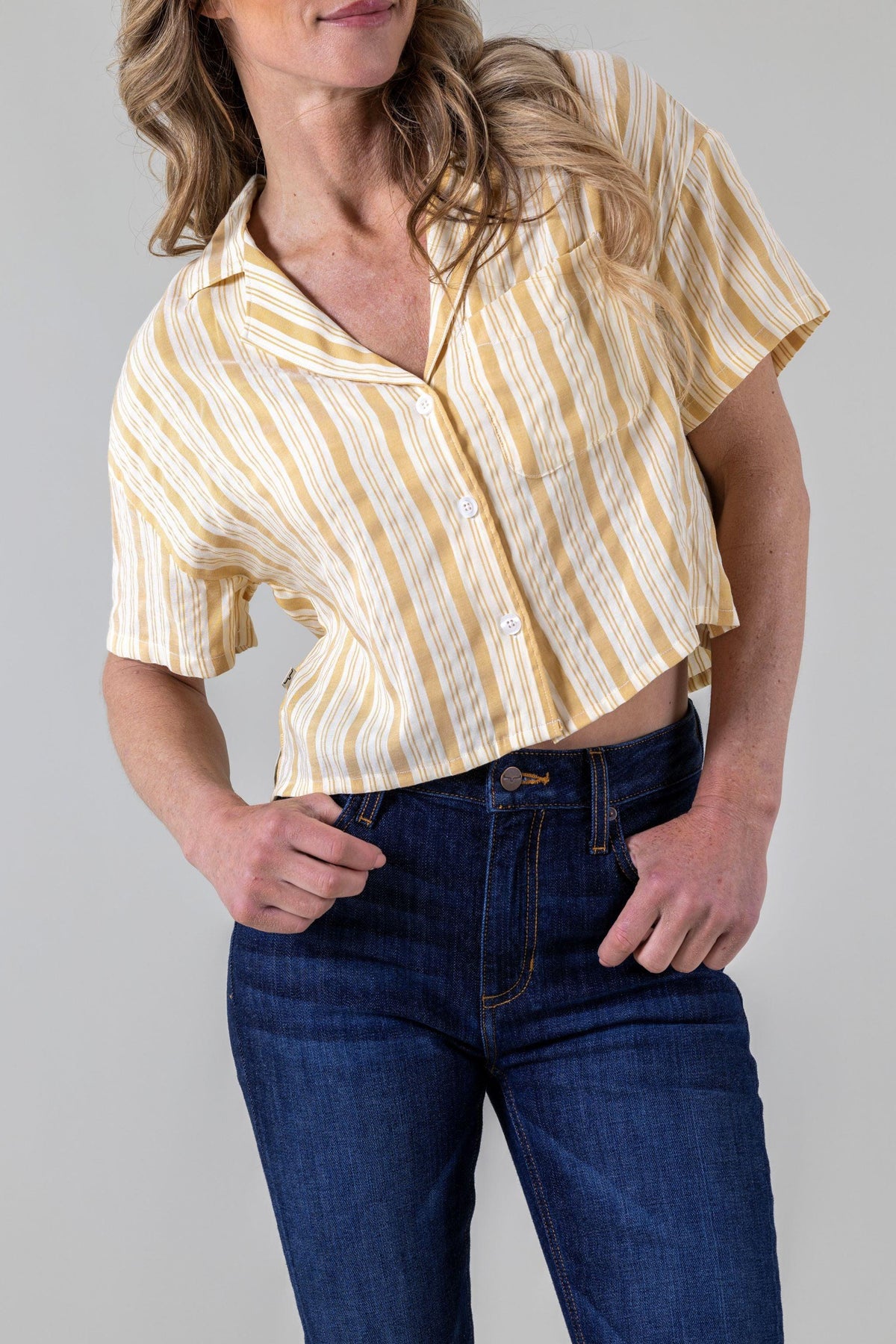 Kimes Ranch Ferris Top in Yellow Ocre with short sleeves and a front pocket