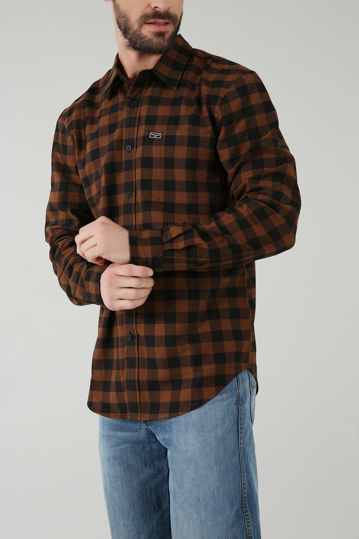 Kimes Ranch Garrison Dress Shirt in Brown with a black check pattern and a chest pocket