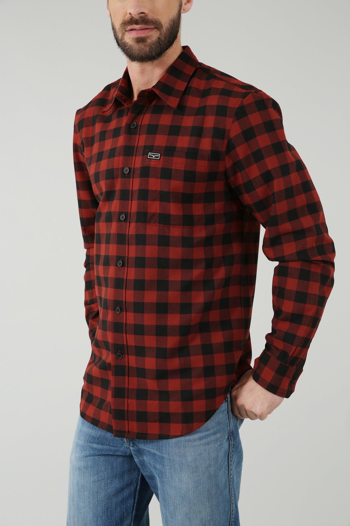 Kimes Ranch Garrison Dress Shirt in Dark Red with a black check pattern and a chest pocket with the Kimes Ranch logo