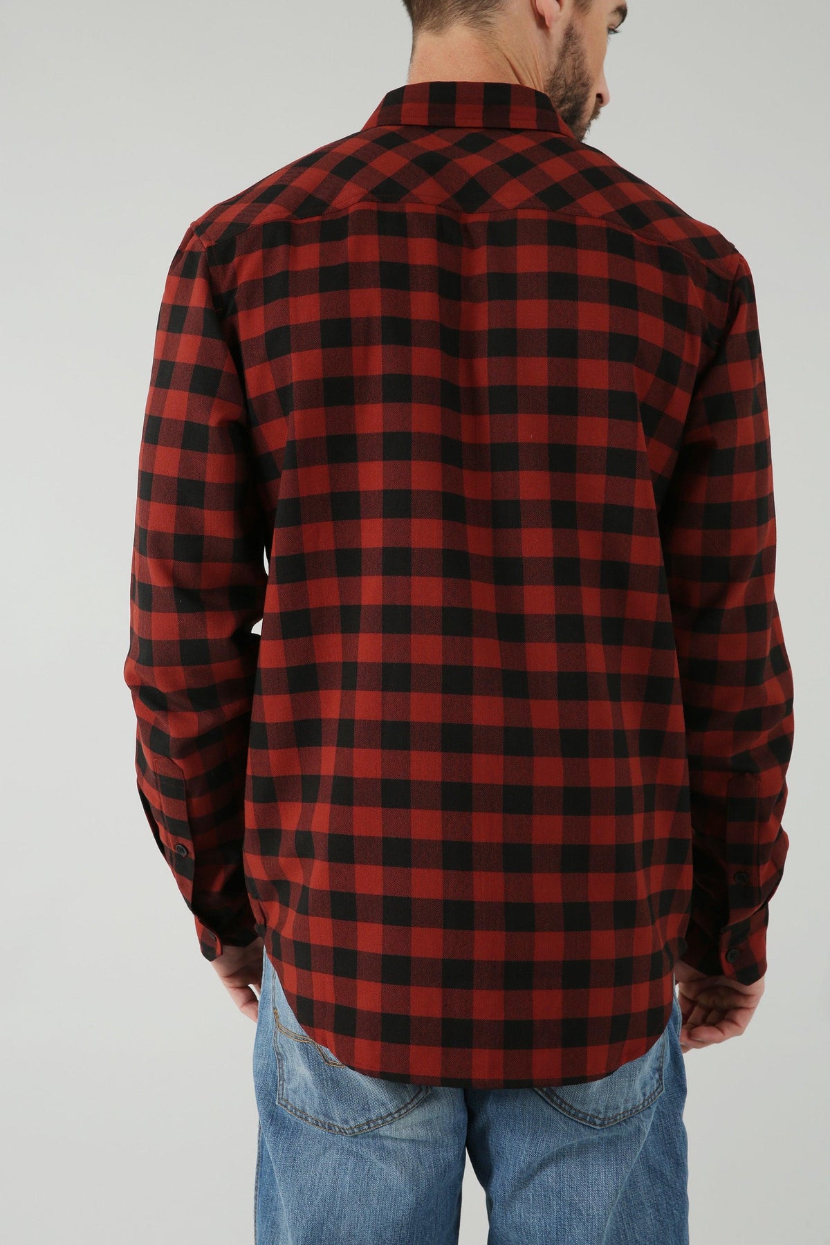 Kimes Ranch Garrison Dress Shirt in Dark Red, back view, with a black check pattern and long sleeves
