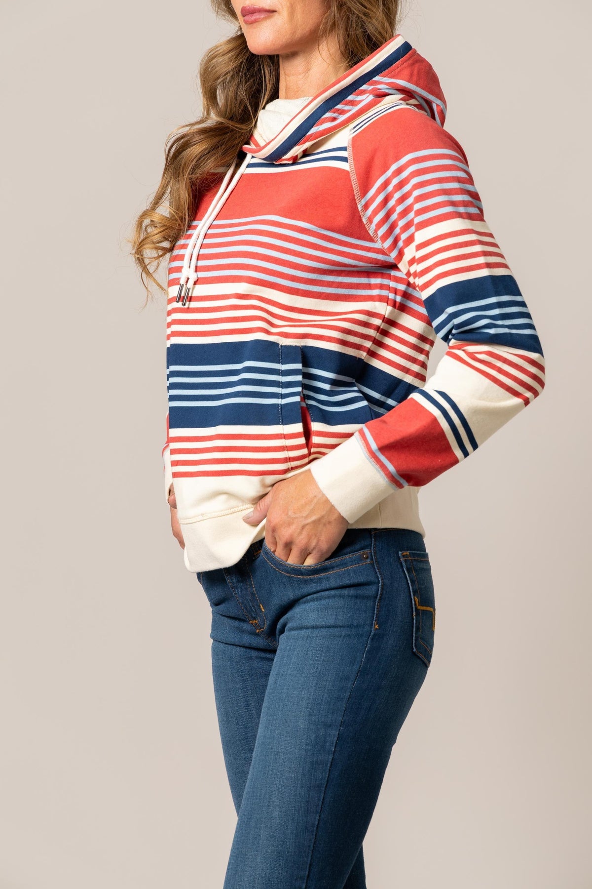 Kimes Ranch Golinda Pullover Hoodie in Navy, side view, with red and white horizontal stripes and a front kangaroo pocket