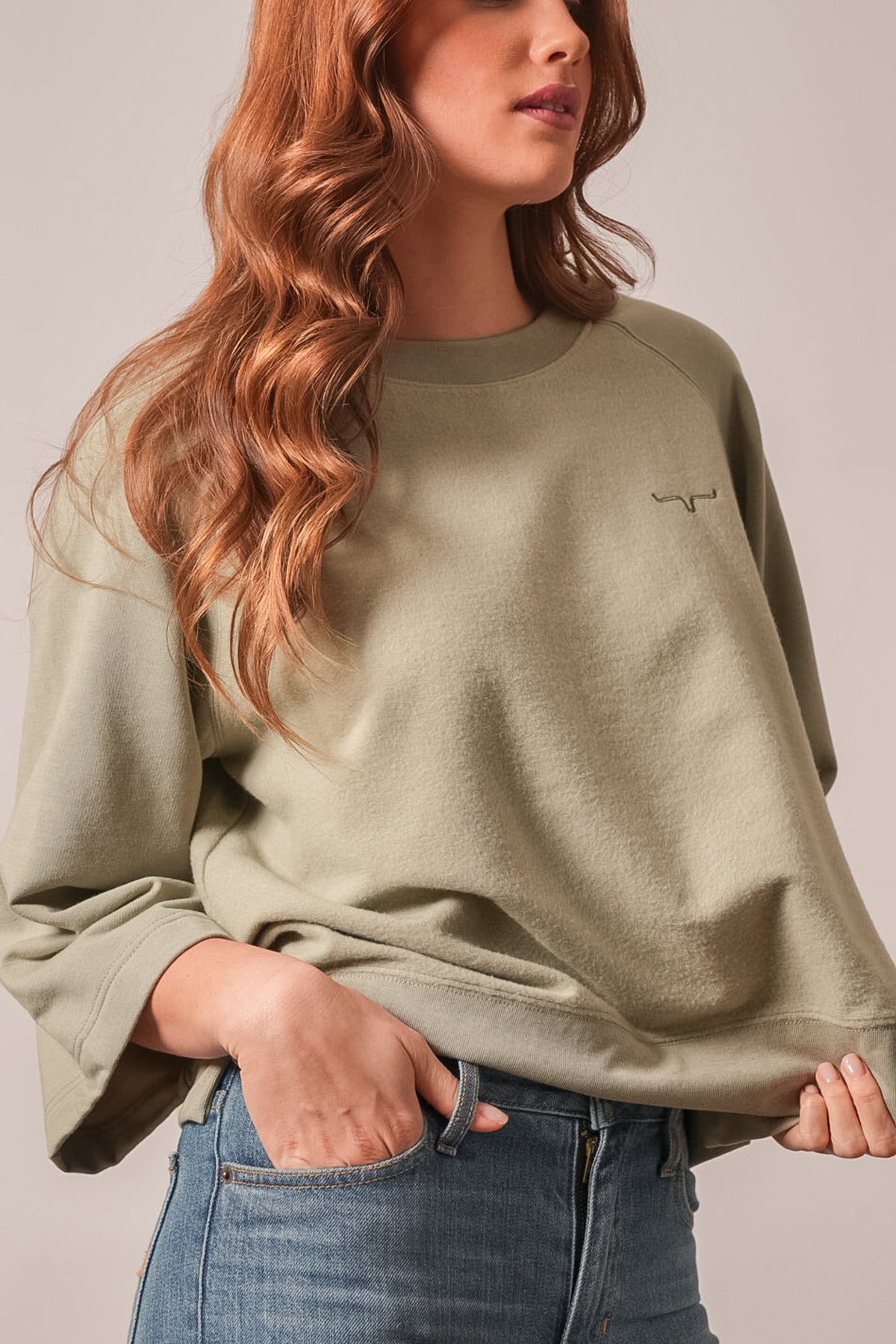 Kimes Ranch Addy sweatshirt in Sage with long raglan sleeves and embroidered logo on the left chest