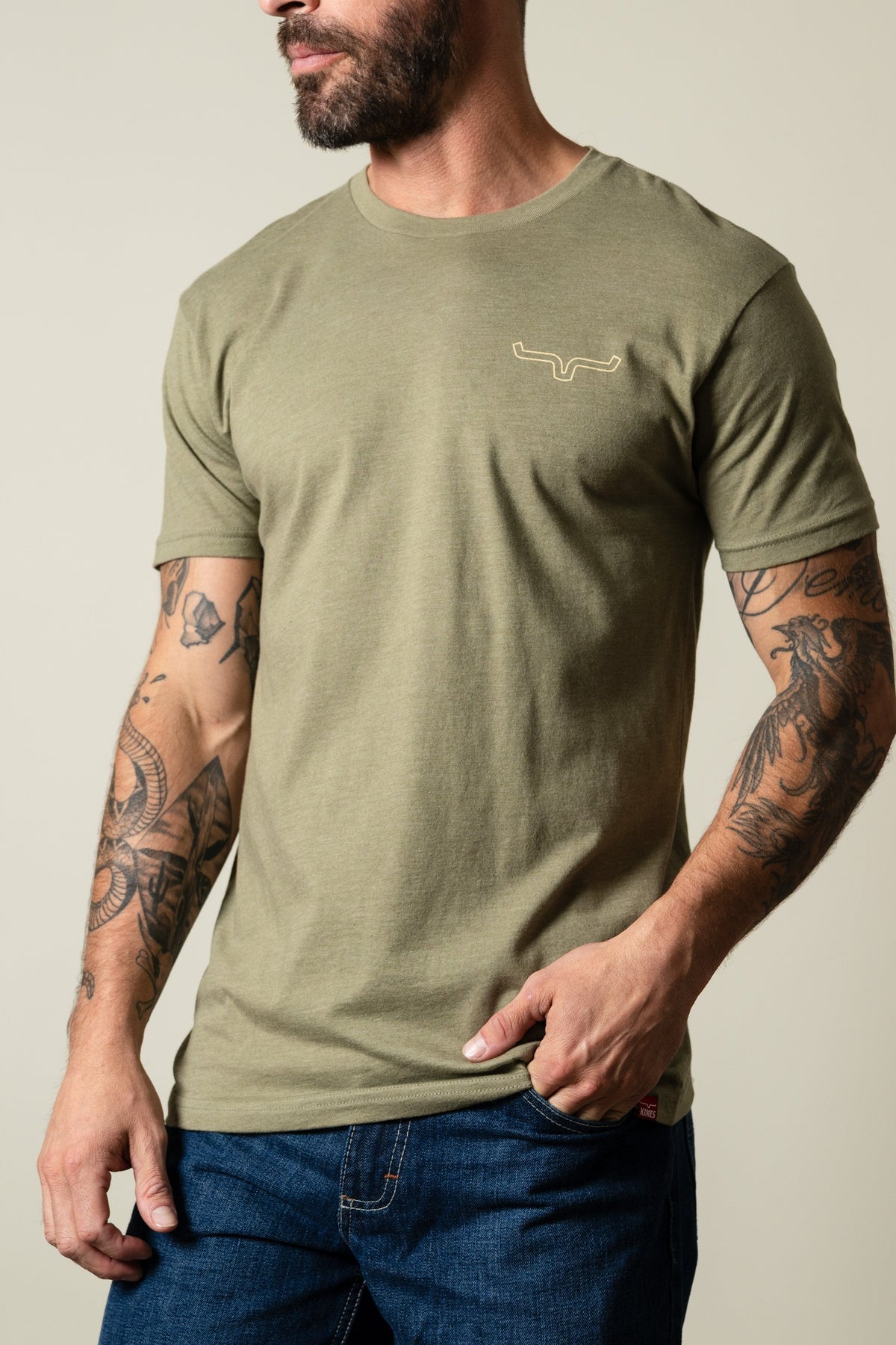 Kimes Ranch Camo Back short sleeve crewneck tee in Light Olive with Kimes Ranch logo on chest