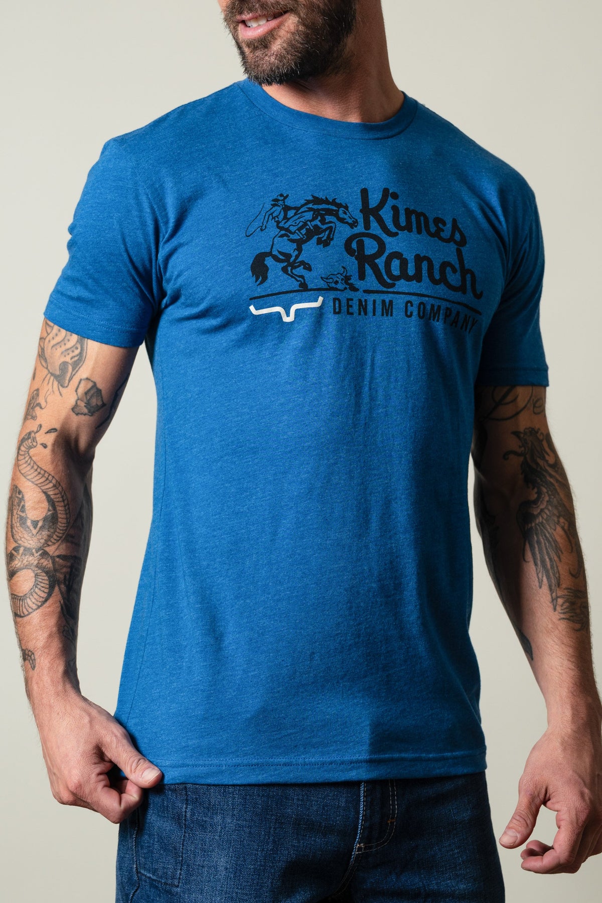 Kimes Ranch Davona Dale Heather Cool Blue short sleeve crewneck t-shirt with logo graphic