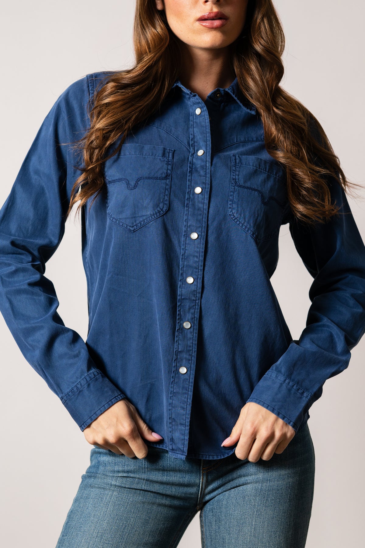 Kimes Ranch Della long sleeve indigo denim top with white button placket and western yoke pockets