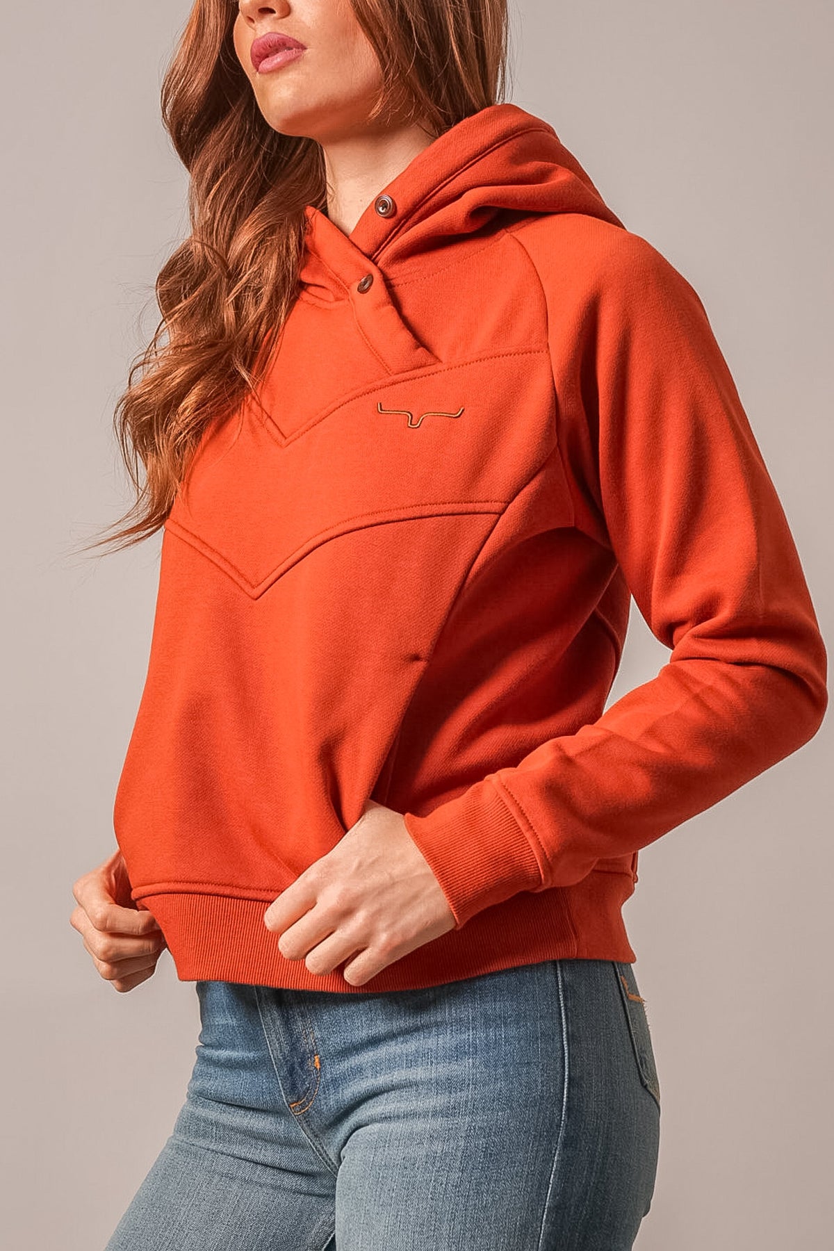 Kimes Ranch Ella hoodie in burnt red with front yoke stitching and Kimes Ranch logo on chest