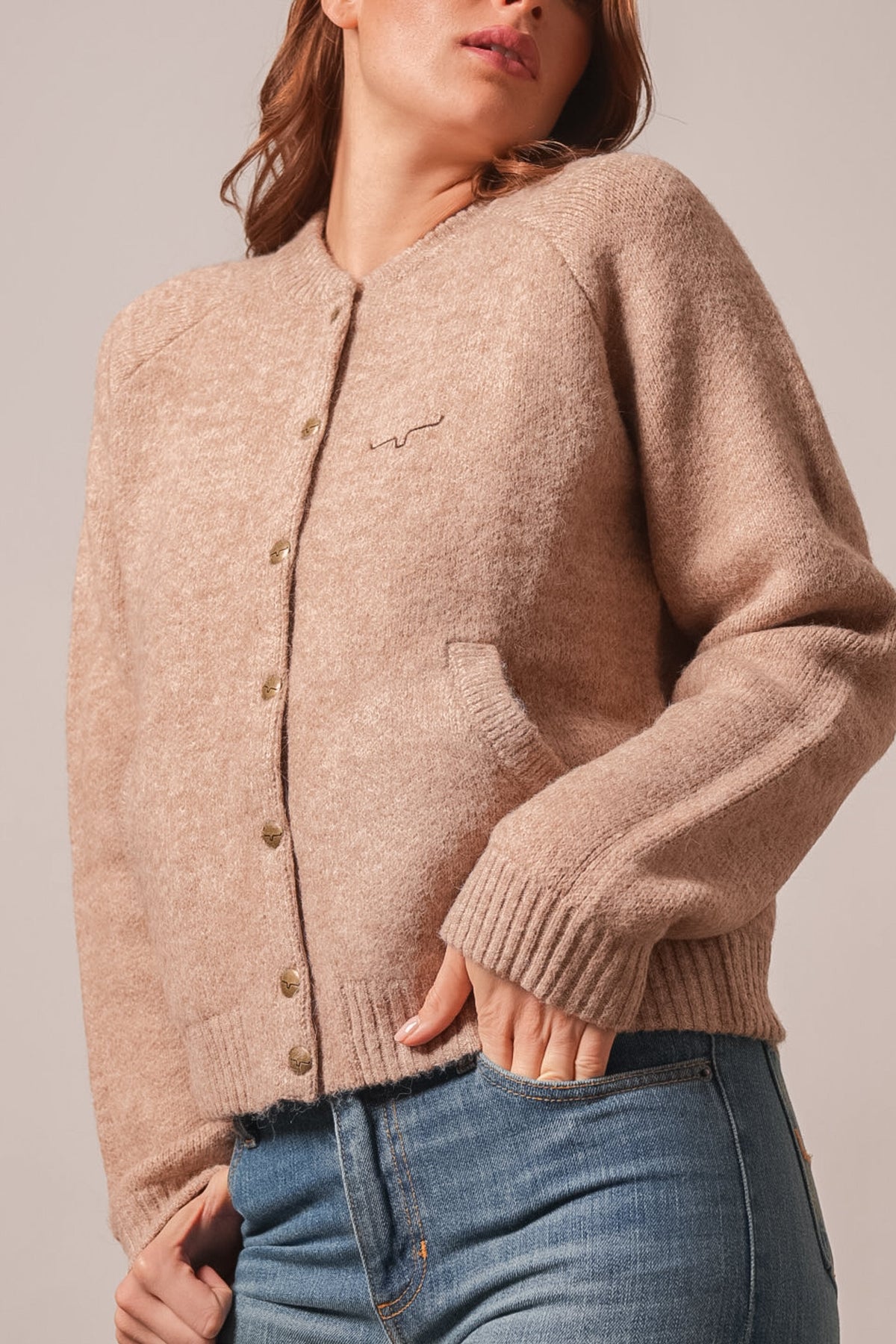 Kimes Ranch Ennis sweatshirt in oatmeal with long sleeves, ribbed knit trim, Kimes Ranch logo, and front patch pockets