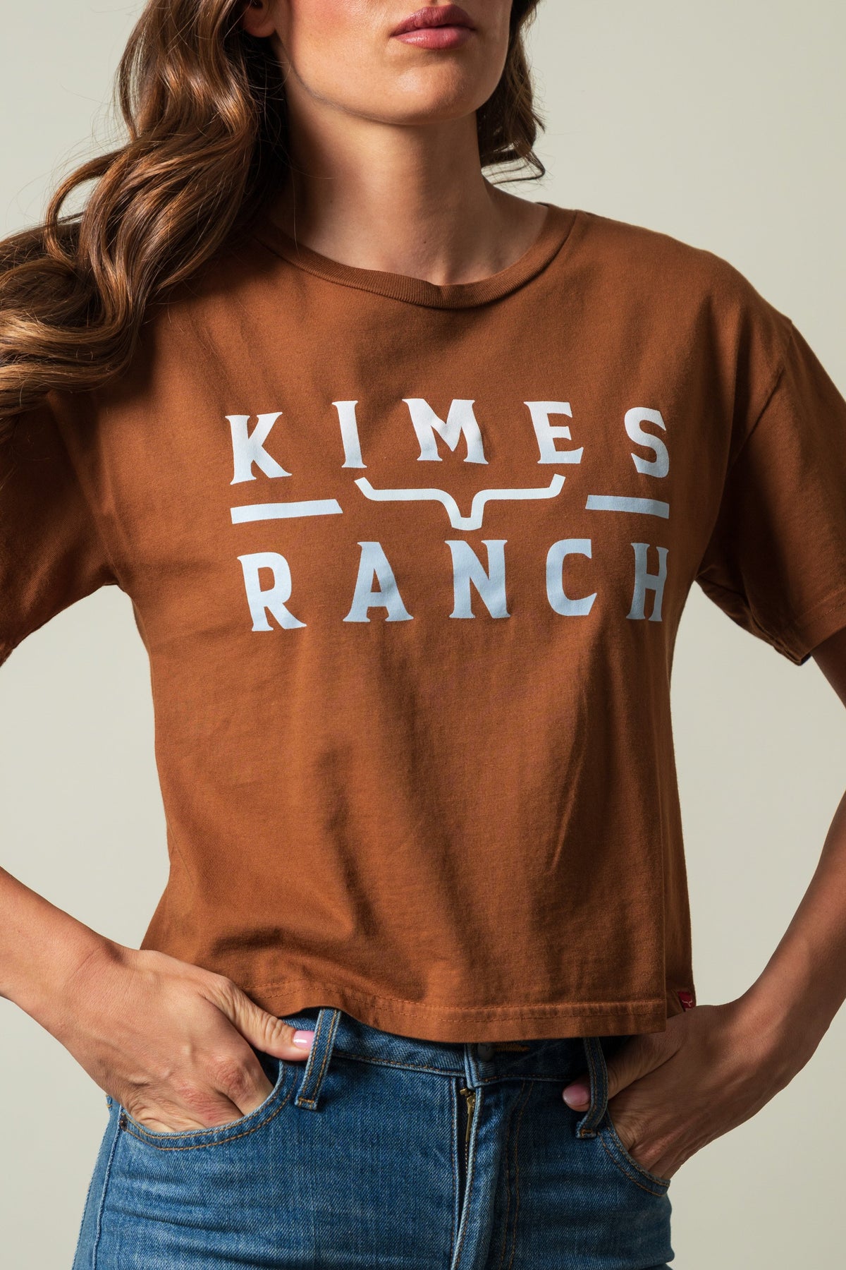 Kimes Ranch Faded Brand short sleeve crewneck shirt in brown featuring white KIMES RANCH logo text and graphic