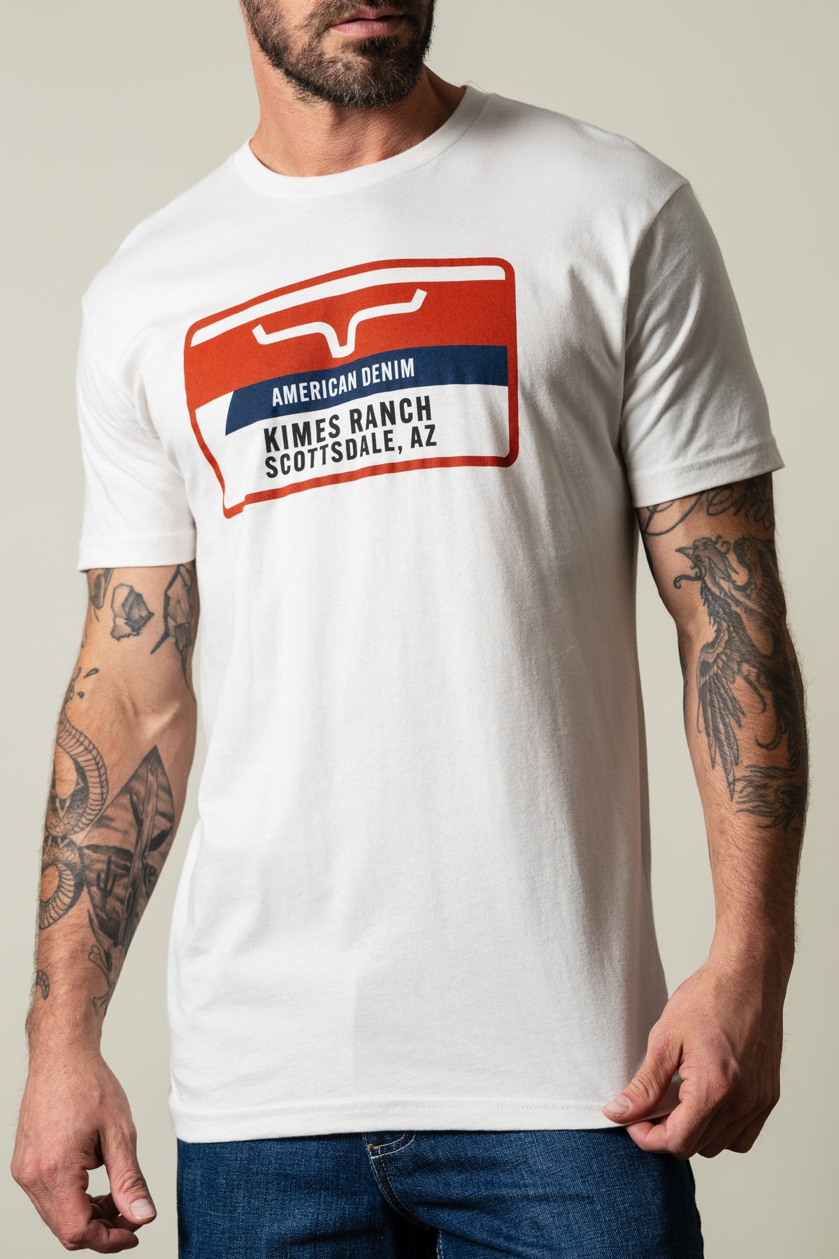 Kimes Ranch Feed Store short sleeve Bone t-shirt featuring American Denim sign graphic with Kimes Ranch Scottsdale AZ wording