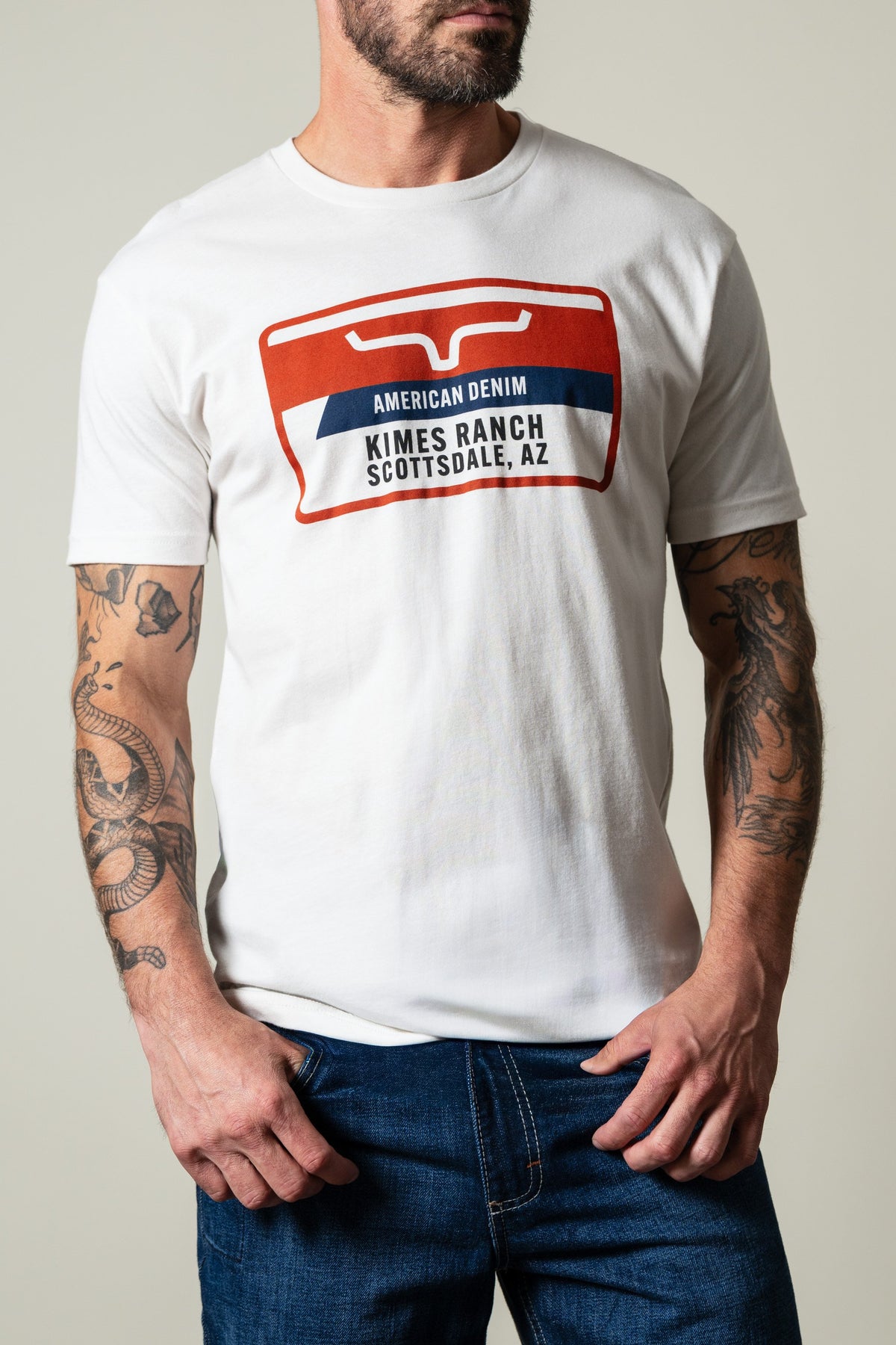 Kimes Ranch Feed Store t-shirt in white, short sleeve crewneck, graphic with red white blue Kimes Ranch Scottsdale AZ text