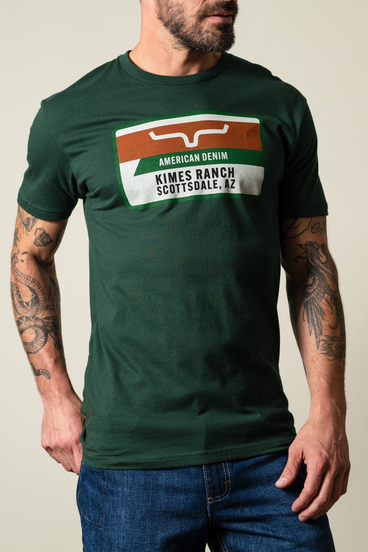 Kimes Ranch Feed Store t-shirt with rectangular graphic print featuring Kimes Ranch logo and text
