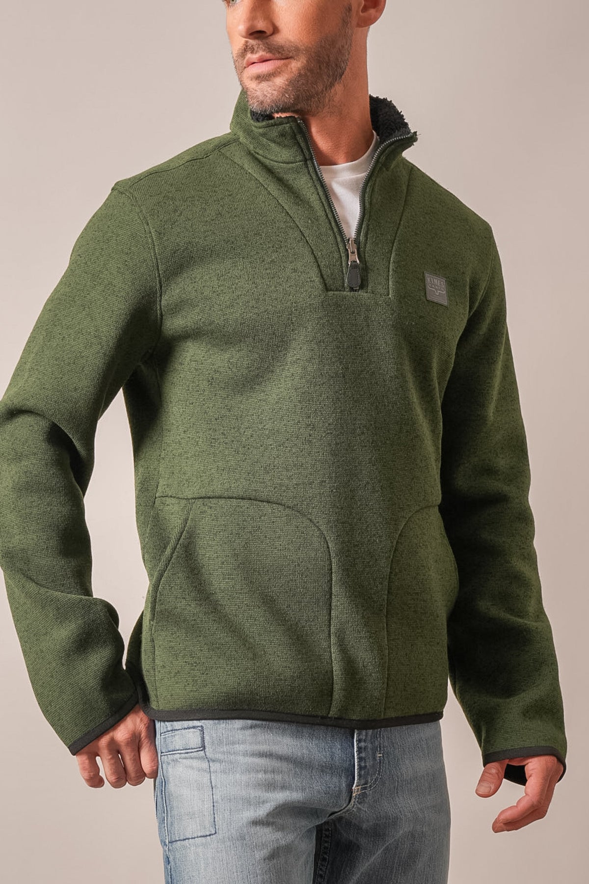 Kimes Ranch Fontana sweatshirt in Forest colour, front view, with quarter-zip, kangaroo pocket, and logo patch on chest