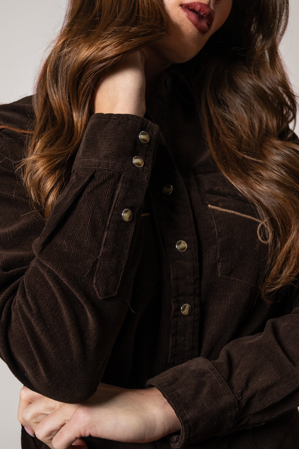 Kimes Ranch Lehi top in Espresso corduroy, featuring contrasting stitching and buttoned cuffs