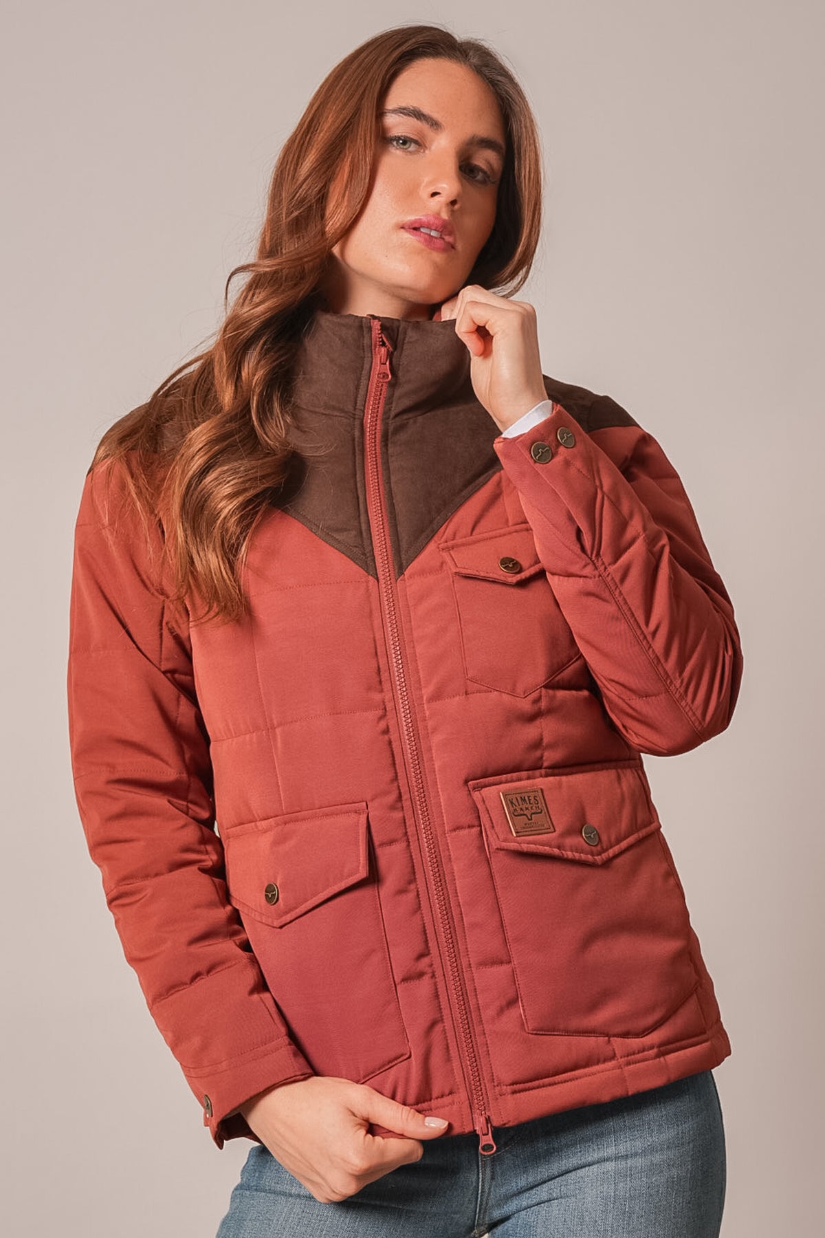 Kimes Ranch Lenora jacket in Burnt Red with quilted body, zip front, patch pockets and Kimes Ranch logo