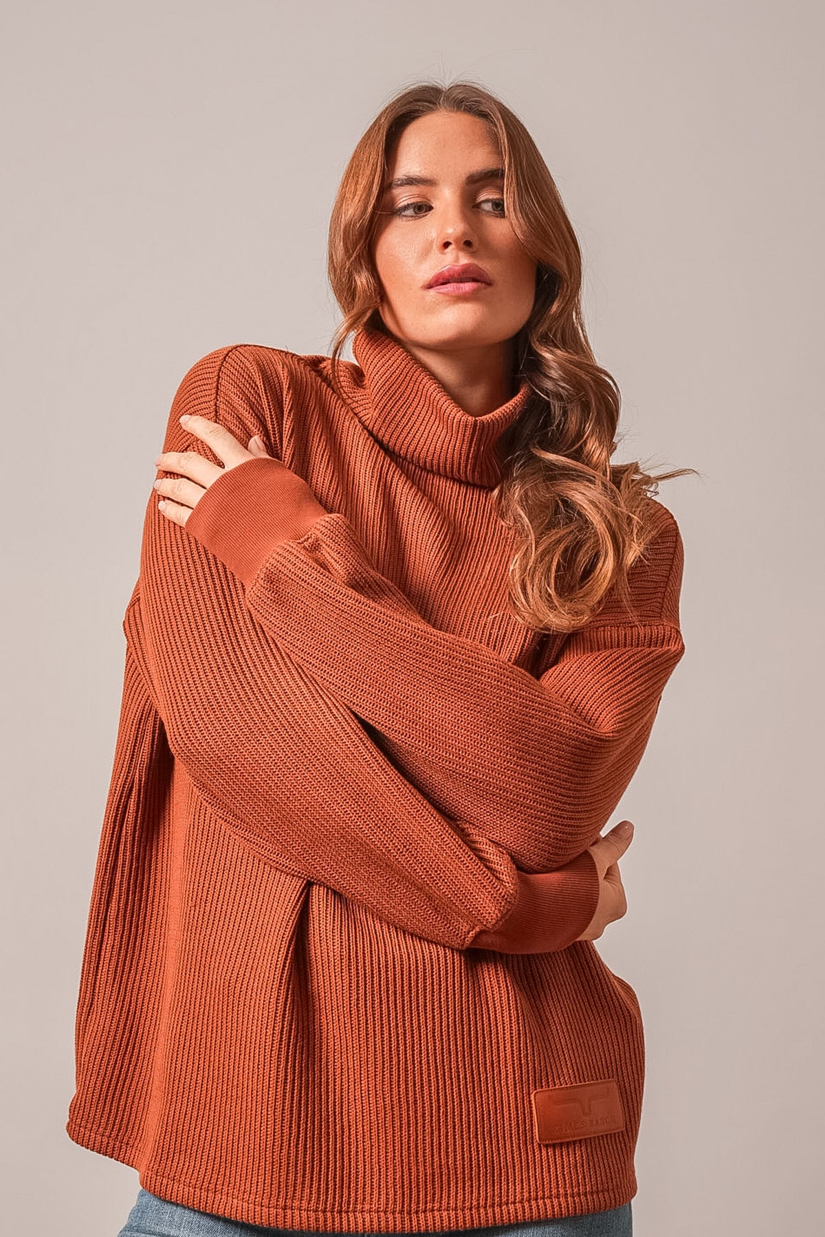 Kimes Ranch Maren sweatshirt in Burnt Red with ribbed knit texture and high turtleneck collar