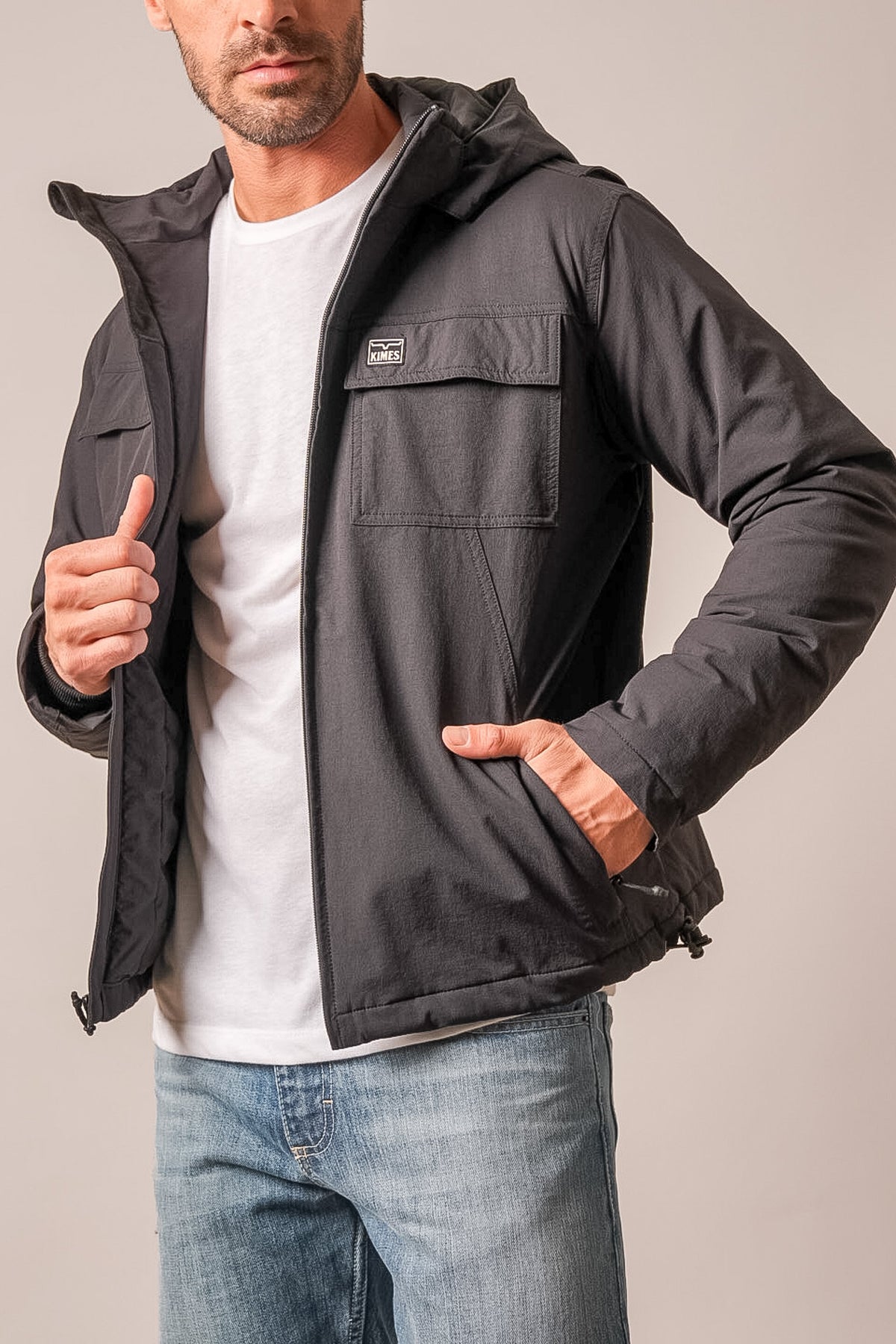 Kimes Ranch Mayfair jacket in Black with a hood, flap chest pocket, and zip front