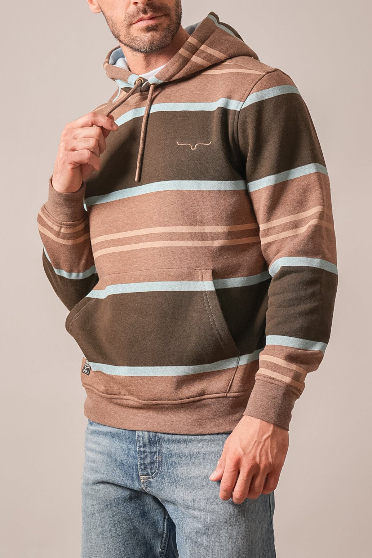 Kimes Ranch Owen hoodie in brown with horizontal stripes in light blue and tan, front kangaroo pocket, Kimes Ranch logo