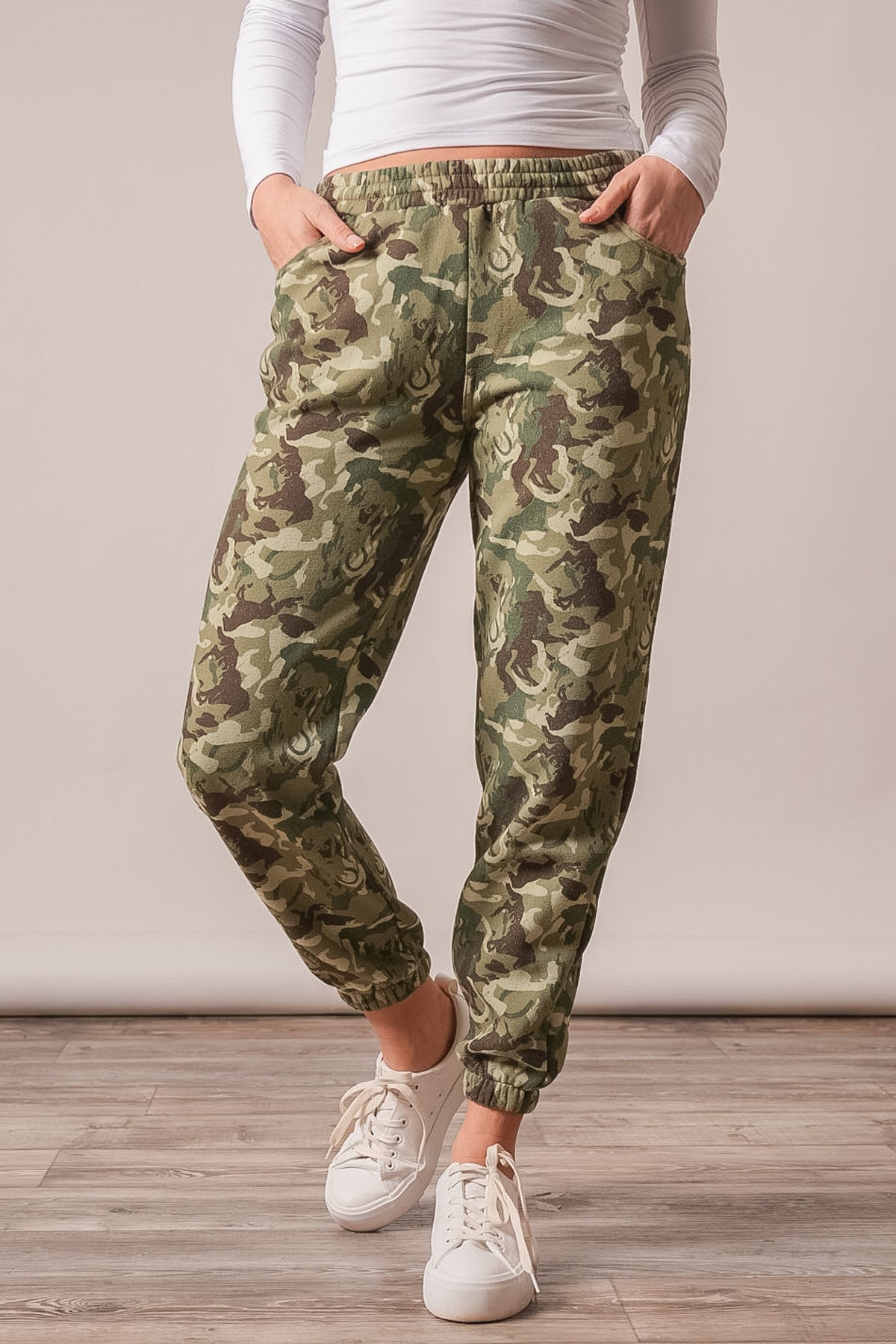 Kimes Ranch Page pants in Camo, featuring front pockets and a drawstring waistband