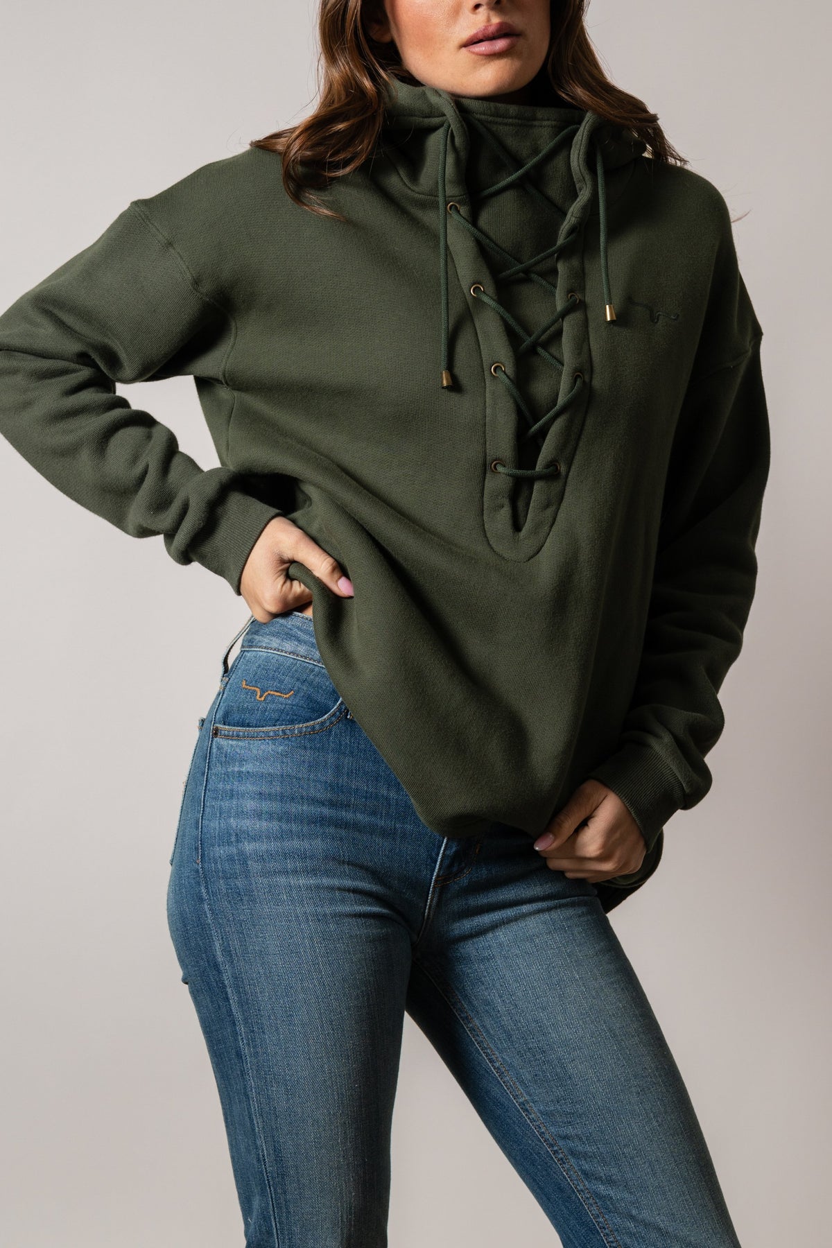 Kimes Ranch Pippi hoodie in Dark Olive with front lace-up detail and long sleeves