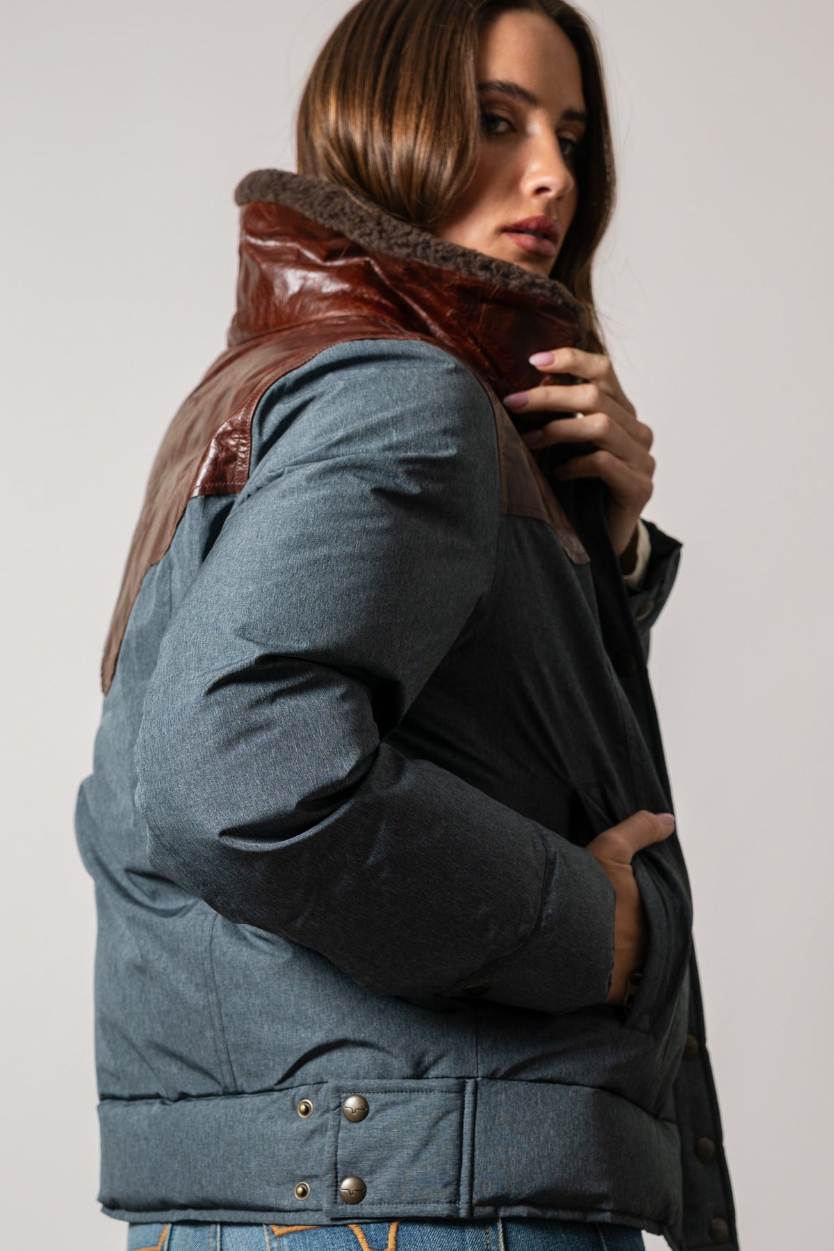 Kimes Ranch Sierra jacket in Black, back view showing brown faux-leather yoke and sherpa collar