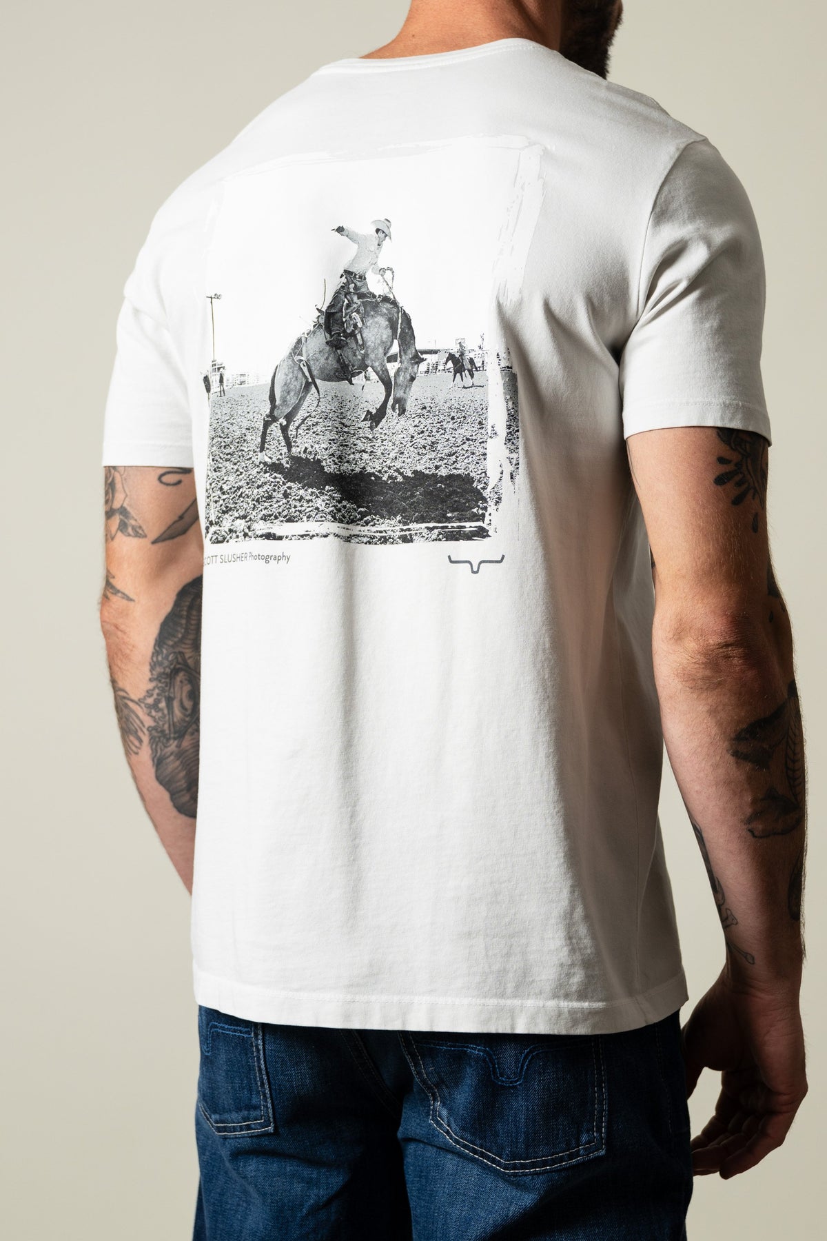 Kimes Ranch SS Bronc Ride shirt in natural with vintage bronc ride photo graphic on back