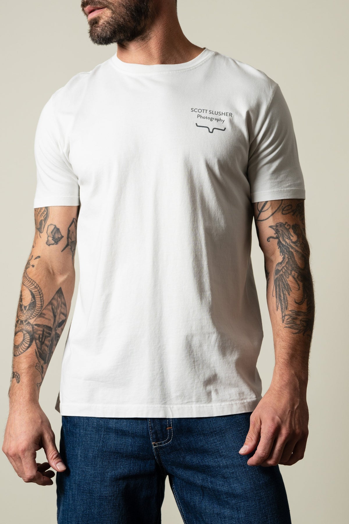 Kimes Ranch SS Bronc Ride short sleeve shirt in white featuring chest graphic SCOTT SLUSHER Photography with logo