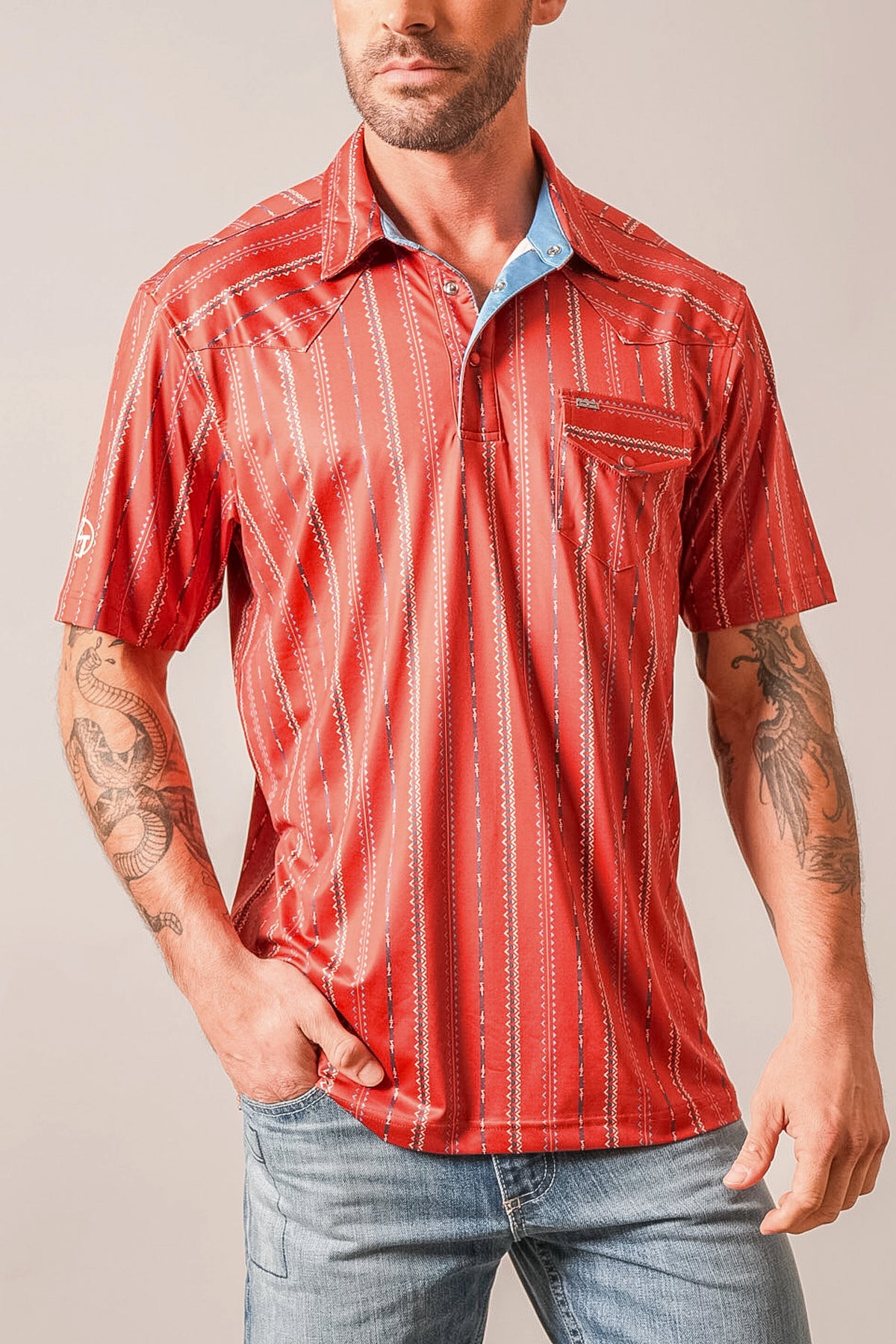 Kimes Ranch ZT Z-Stripe polo shirt in Brick Red with vertical zebra stripes and a contrasting blue inner collar
