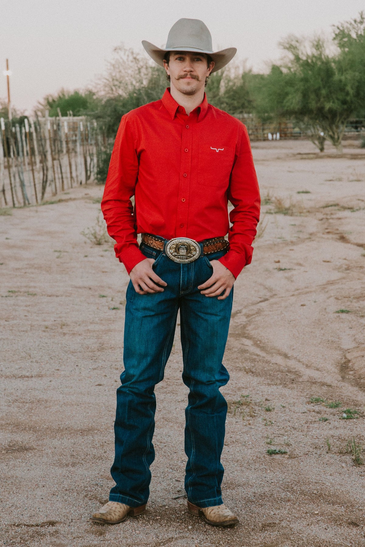 Kimes Ranch KR Team Dress Shirt in Red with long sleeves and a chest pocket featuring the Kimes Ranch logo