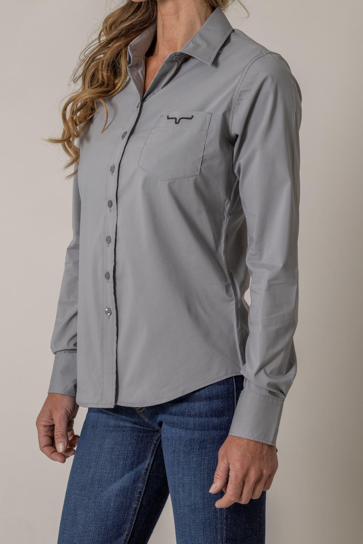 Kimes Ranch Ladies KR Team Shirt in Grey, side view, with a chest pocket and embroidered logo