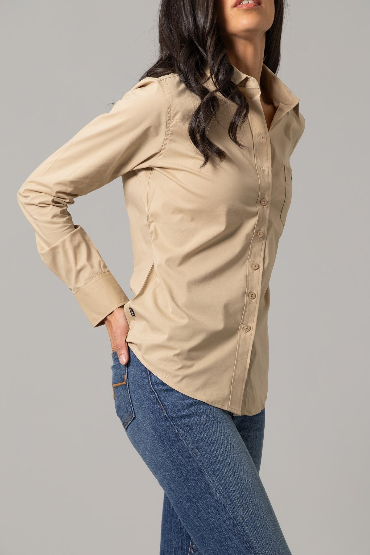 Kimes Ranch Ladies KR Team Shirt in Khaki, side view, with long sleeves and a button front